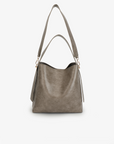 Paloma Waxed vegan leather shoulder bag in gray featuring a wide single strap handle and gold-tone buckle hardware on the side with detachable adjustable strap by Remi and Reid.