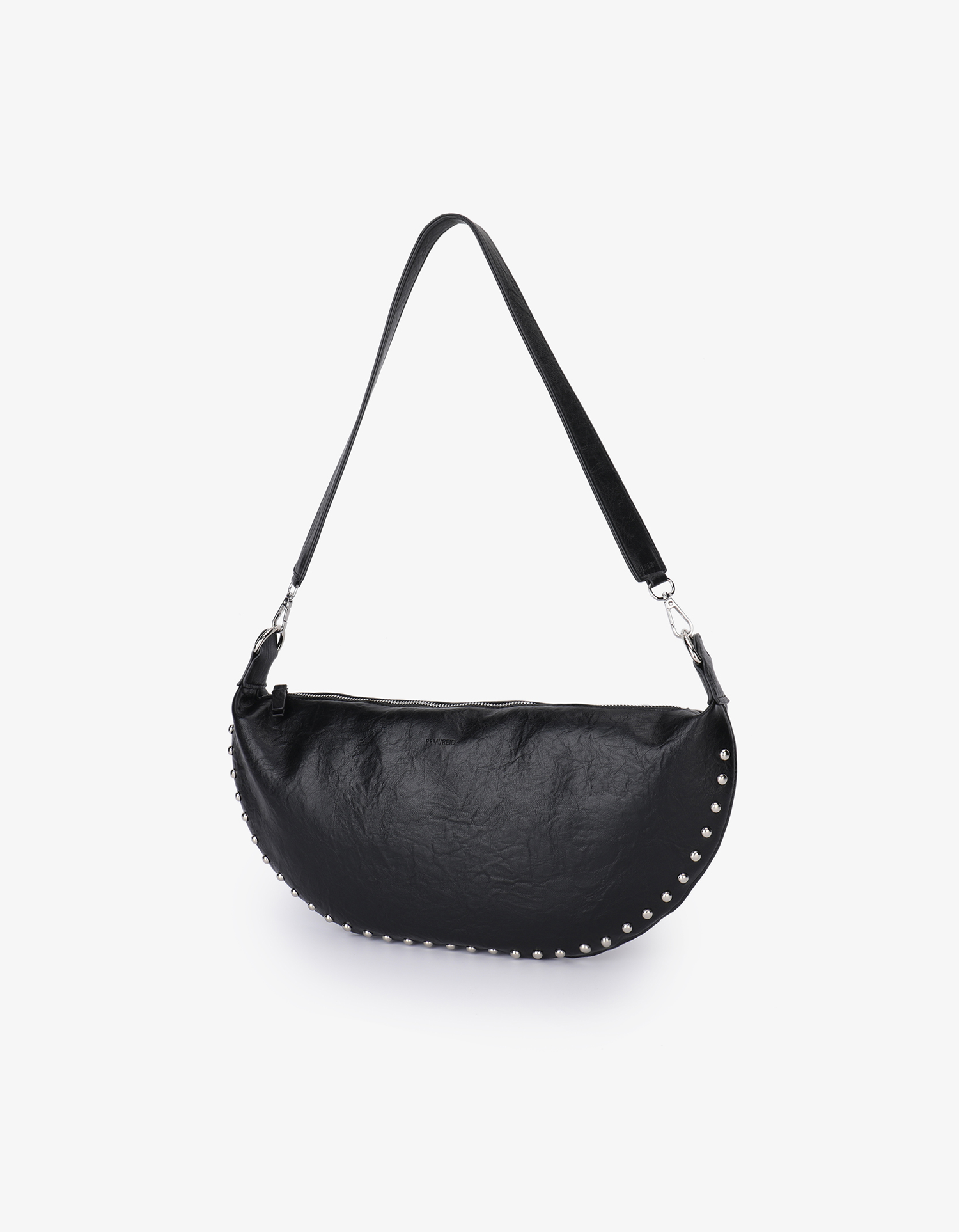 Black Peppa vegan leather bag with silver-tone studs on seam by Remi and Reid.
