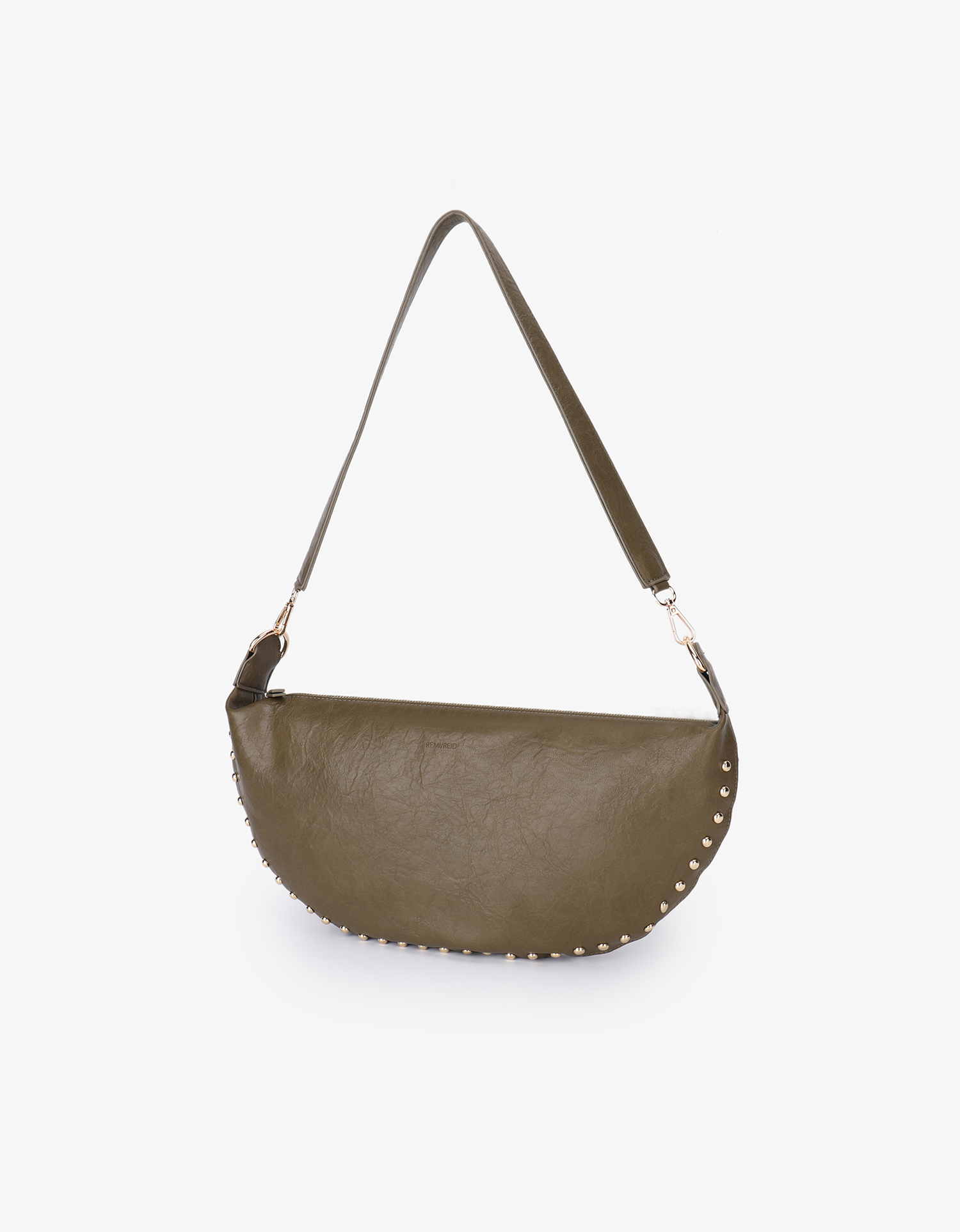 Peppa Studded bag in olive green mustard yellow vegan leather with gold-tone studs along the curved edges by Remi and Reid.