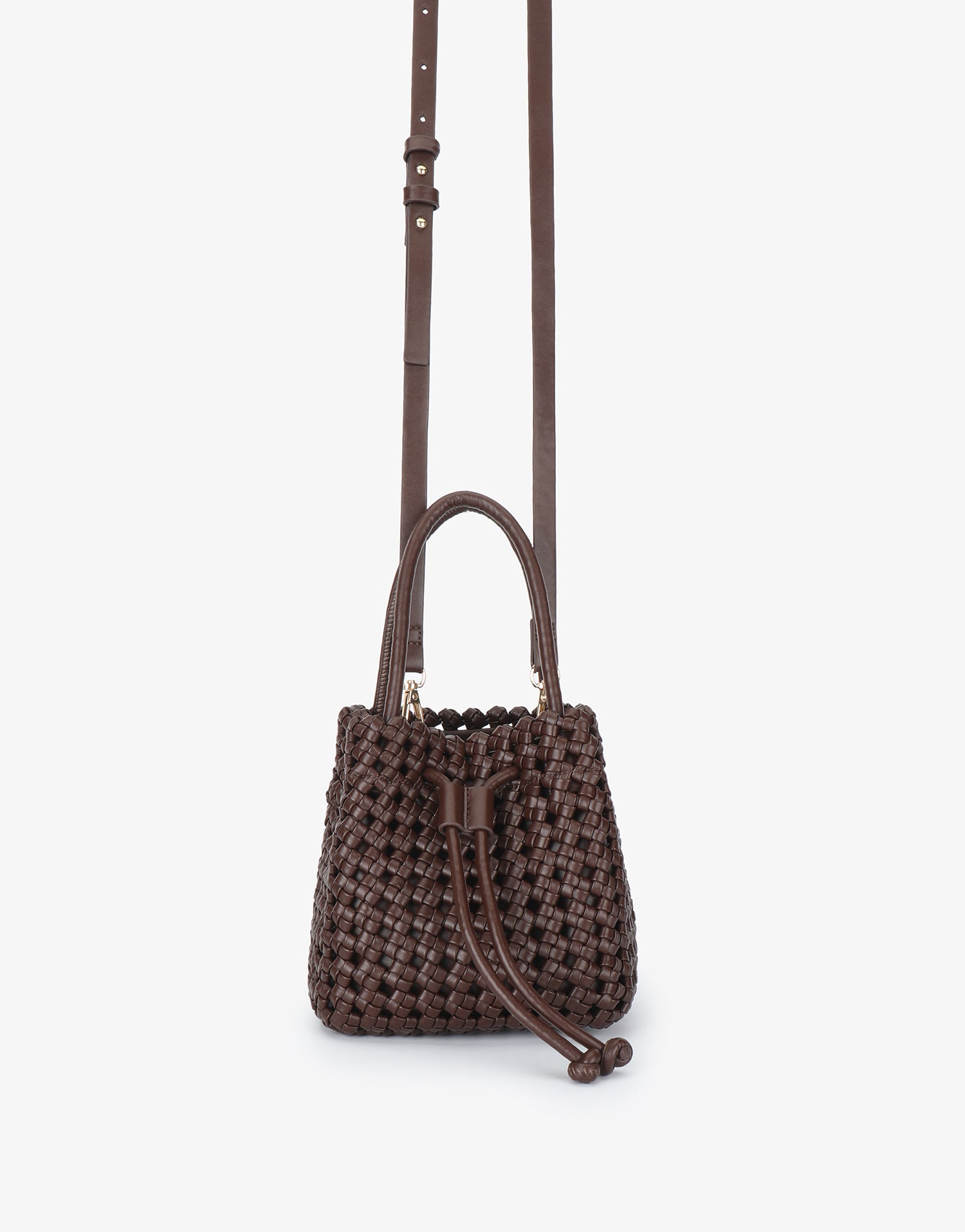 Perrie Bucket Mini Woven Square bag by Remi and Reid featuring a rich brown textured basket weave design and adjustable crossbody strap.
