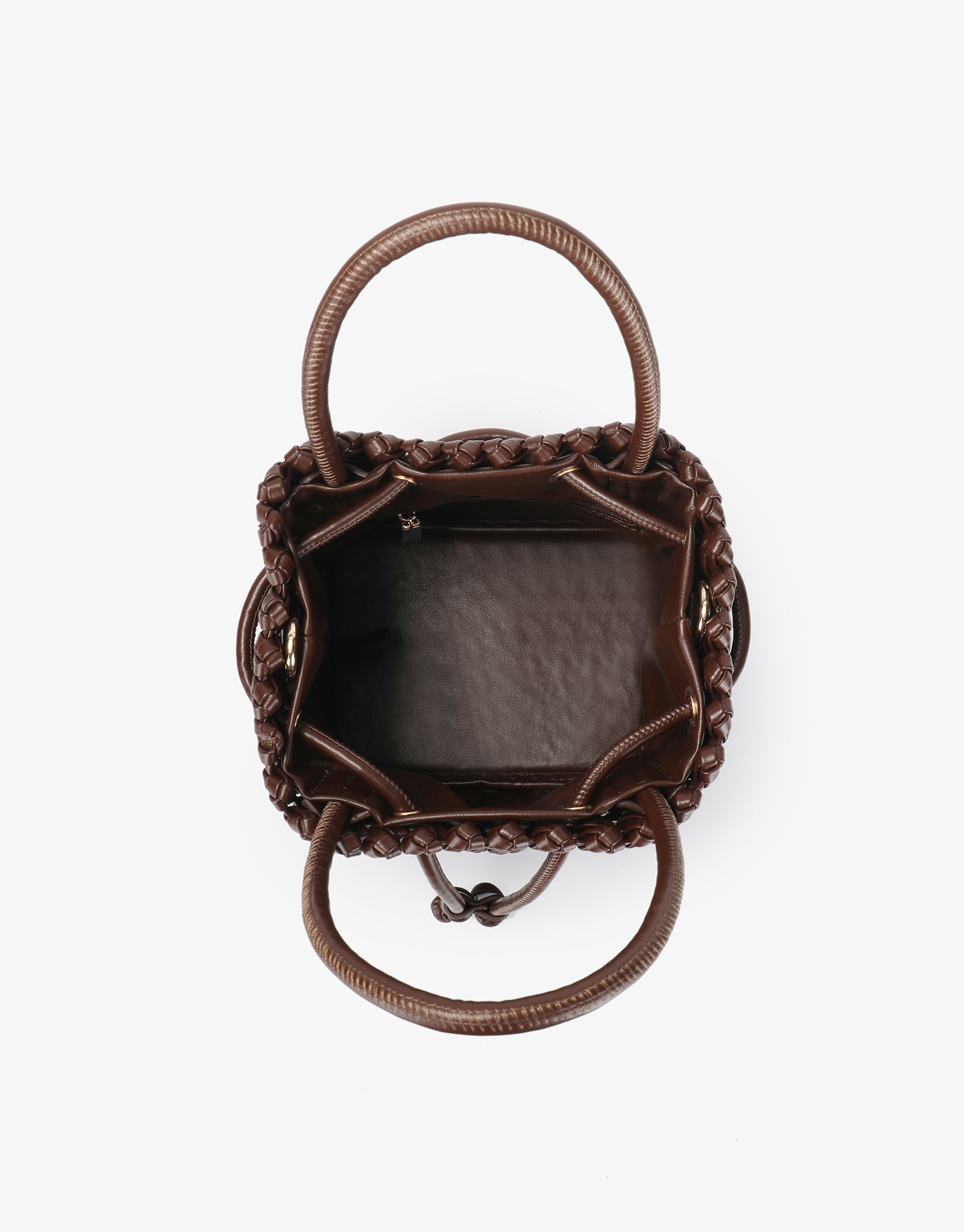 Interior of espresso Perrie Bucket Mini by Remi and Reid, revealing the spacious inner compartment and drawstring detail.