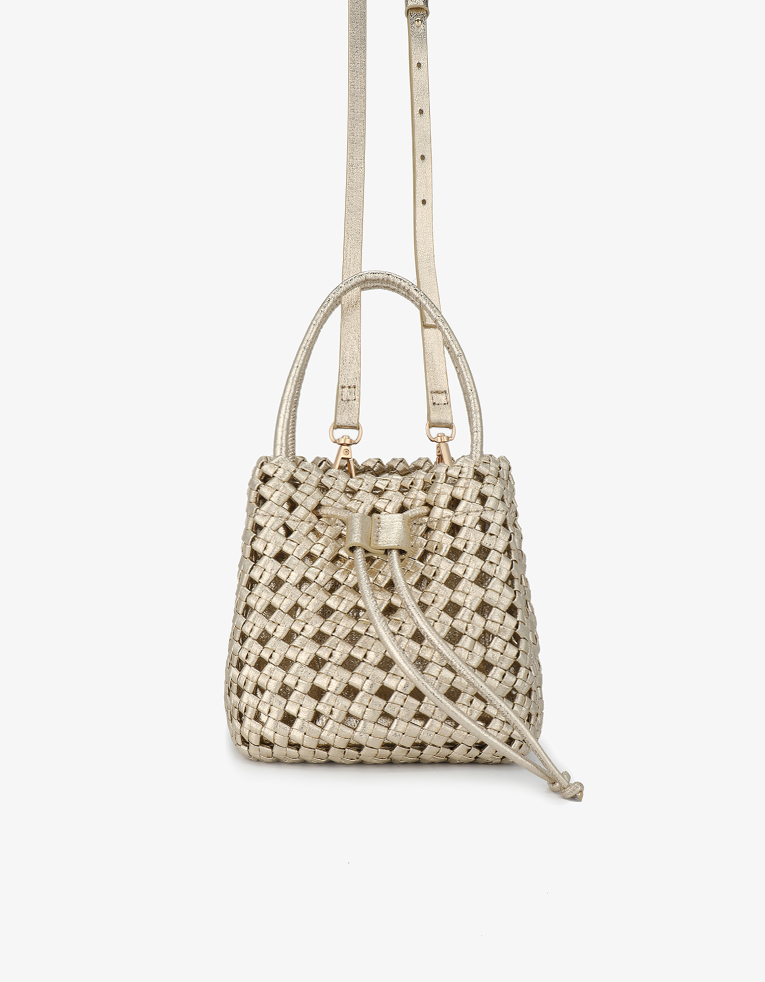 Metallic platinum woven square bag by Remi and Reid featuring a matching slim crossbody and shoulder strap.
