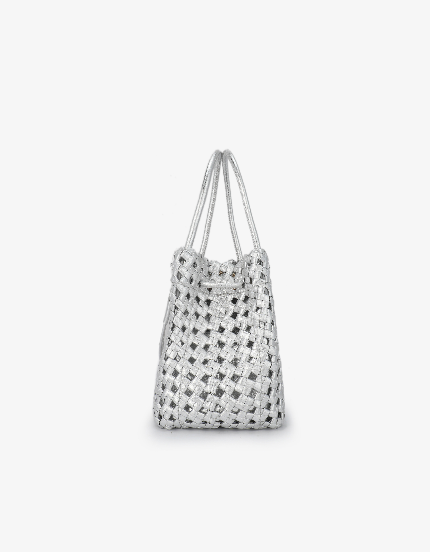 Side perspective of the hi-shine silver Perrie Bucket Mini by Remi and Reid showing the sturdy woven construction.
