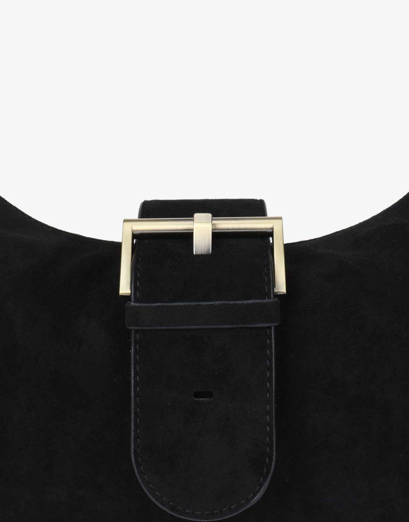 Close-up view of black faux suede bag with a gold buckle_Remi and Reid