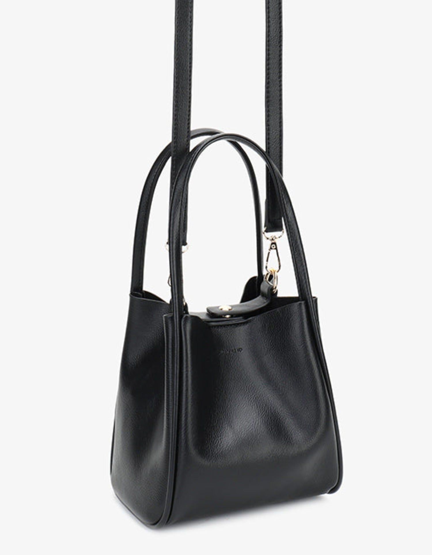 Hollace mini tote in black with detachable, adjustable crossbody strap by Remi and Reid.