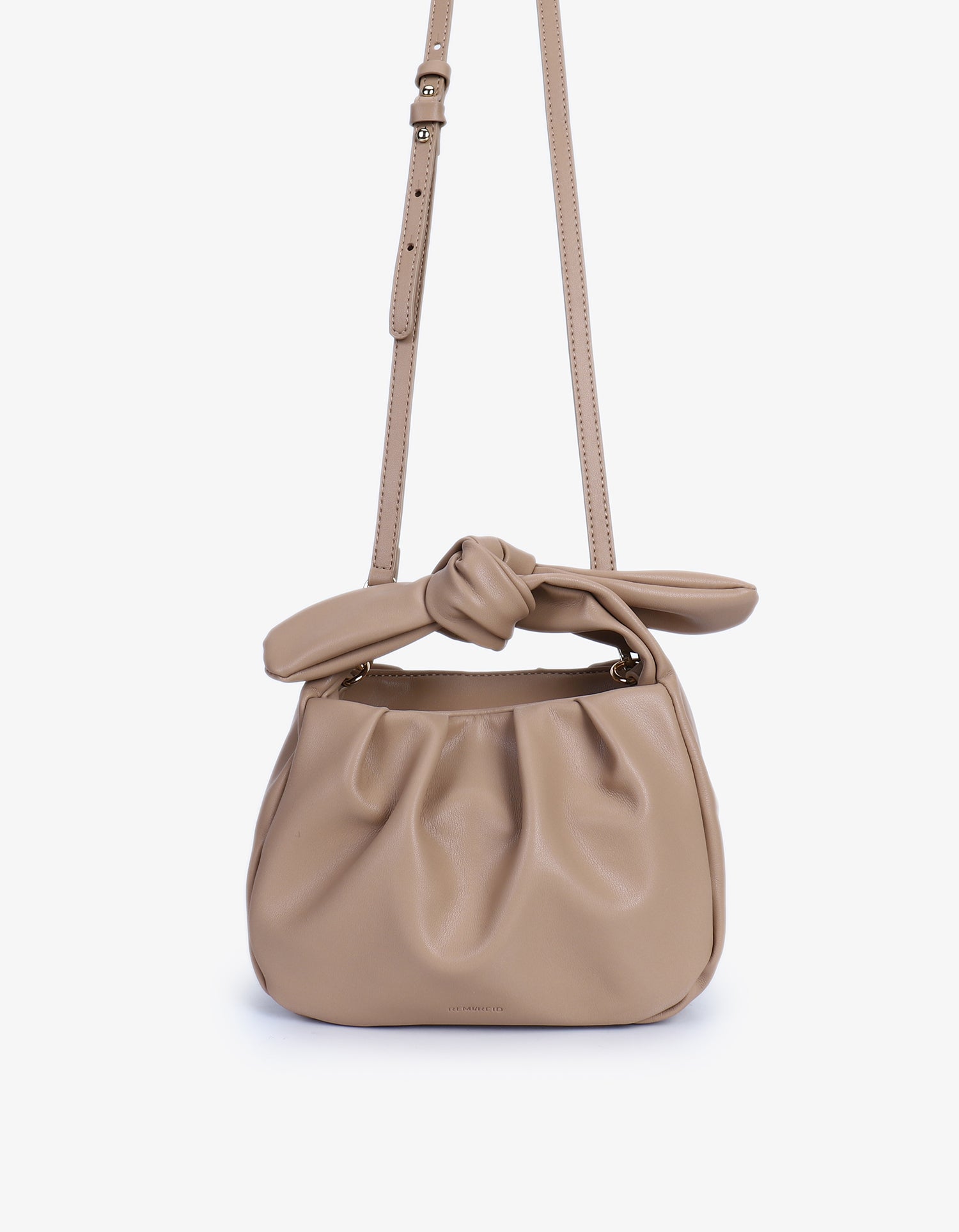 DARYL BOW TIE CROSSBODY LIGHT TAN
